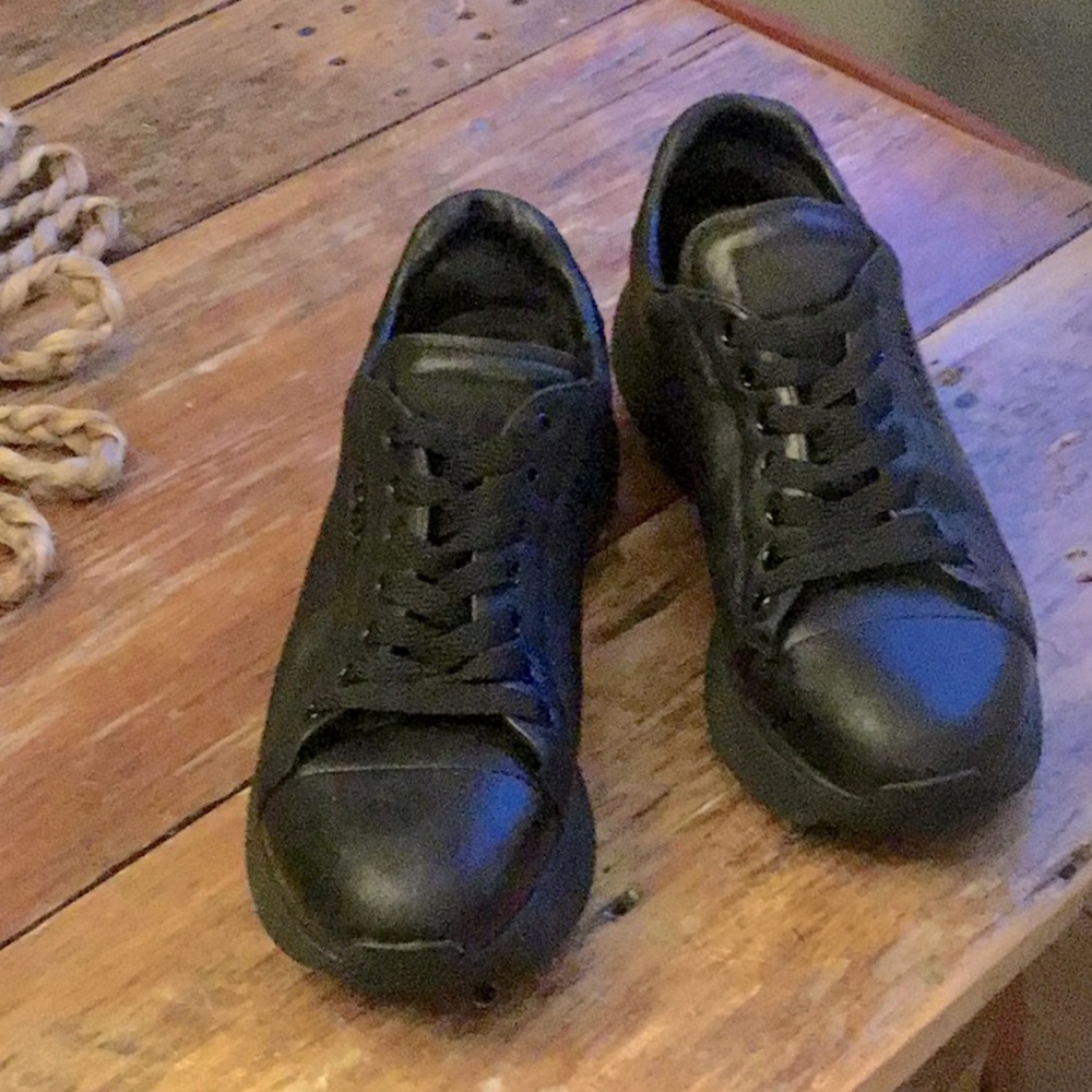 Women’s Black Prada Sneakers.